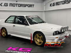 Pink KG Motorsport Logo on Showroom Floor