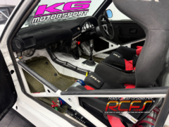 Bold KG Motorsport logo on windshield